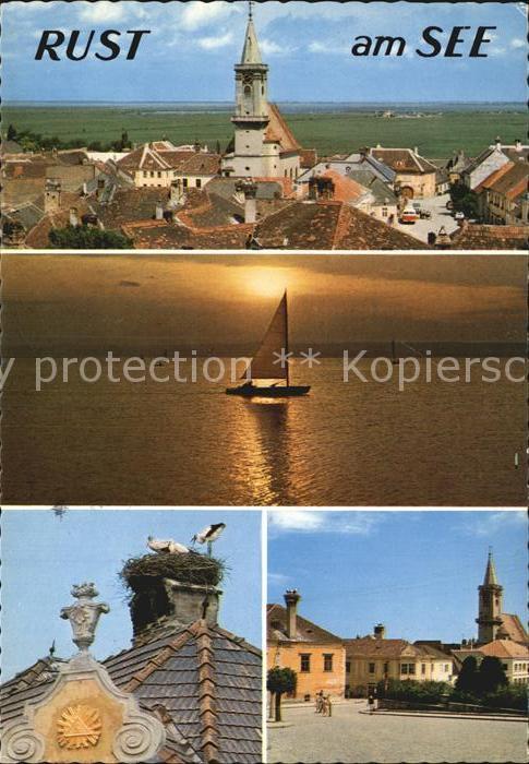 Rust Burgenland Ortsansicht mit Kirche Storchennest Segeln Abendsonne