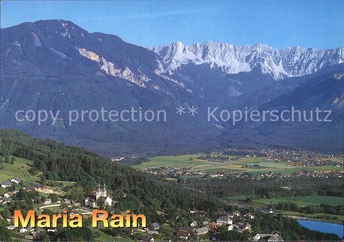Maria Rain Kaernten Panorama Wallfahrtsort gegen Ferlach und Koschuta Bergmassiv