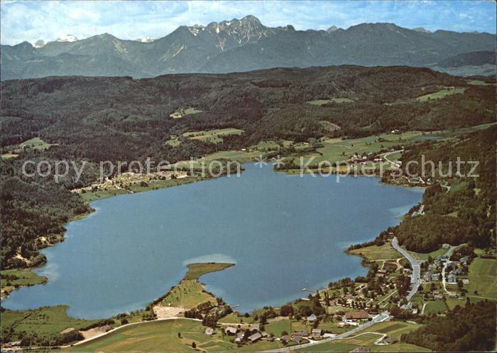 Keutschach See mit Mittagskogel Campingplaetzen und Strandbaedern Fliegeraufnahm