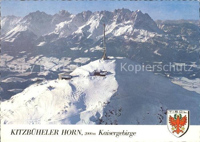 Kitzbuehel Tirol Kitzbueheler Horn Blick zum Kaisergebirge Winterpanorama Fliege