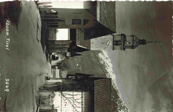 Absam Tirol AT Dorfstrasse mit Kirche