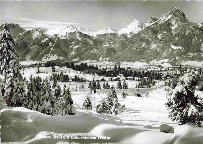 Reutte Tirol AT Winterpanorama mit Blick zum Hahnenkamm