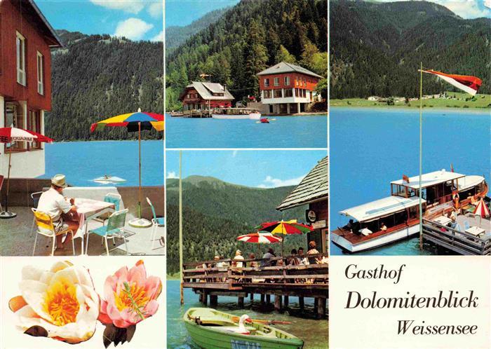 Weissensee Kaernten AT Gasthof Dolomitenblick Terrasse Seepartien Bootssteg