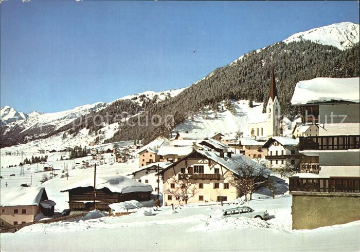 St Jakob Arlberg Ortsansicht mit Kirche im Winter