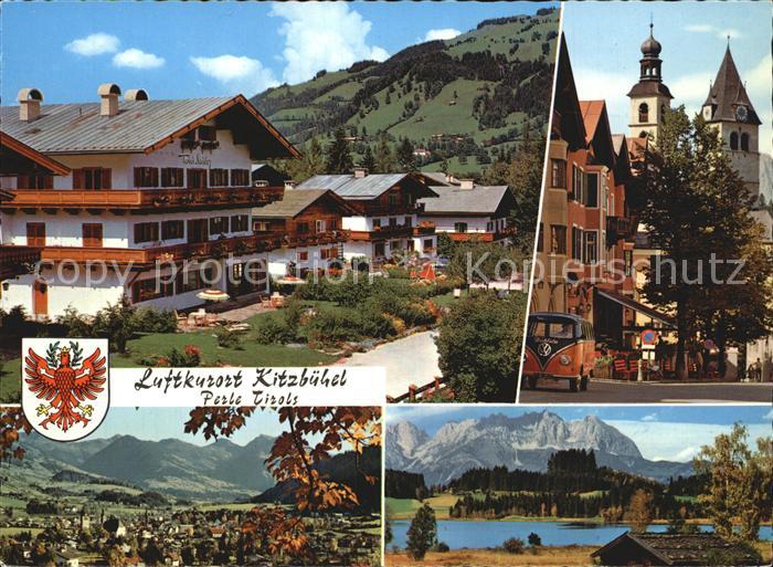 Kitzbuehel Tirol Strassenpartie mit Haus Toni Sailer Stadtpfarrkirche Panorama S