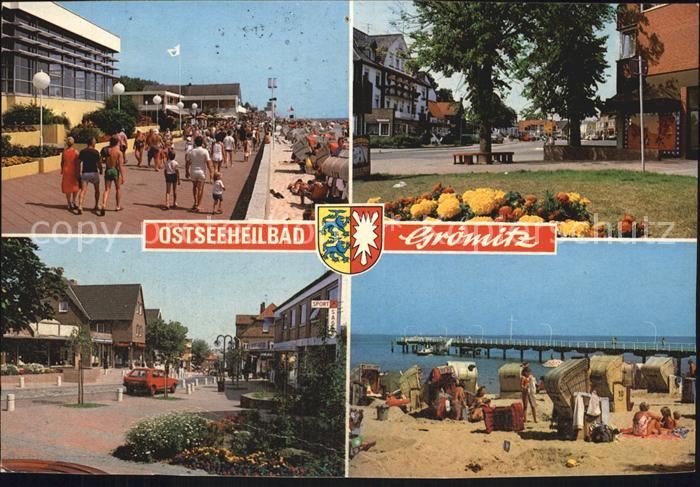 Groemitz Ostseebad Promenade Strassenpartie Strand Seebruecke