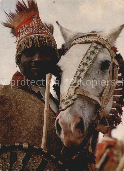 Typen Afrika Warrior in traditional dress Ethiopia Pferd