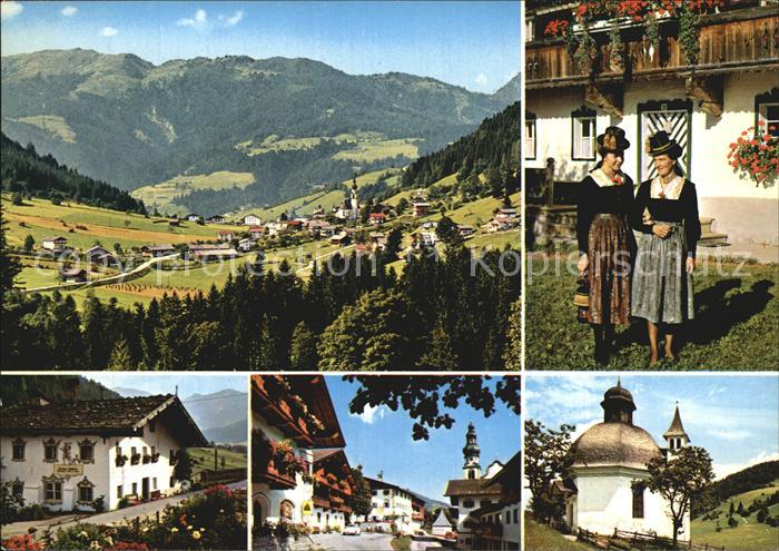 Oberau Tirol Hochtal Wildschoenau Frauen mit Tracht Kirche Ortsansichten