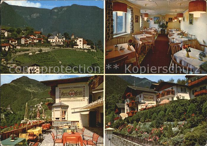 Dorf Tirol Teilansicht Pension Garni Herzguetl Gaststube Terrasse