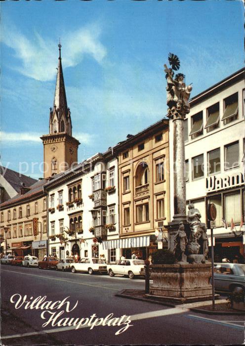 Villach Kaernten Hauptplatz mit Dreifaltigkeitssaeule und Stadtpfarrkirche