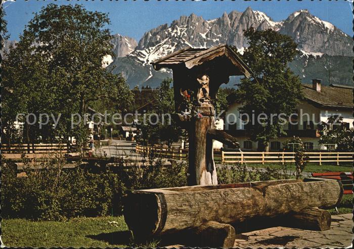 St Johann Tirol Malerischer Dorfbrunnen am Wilden Kaiser