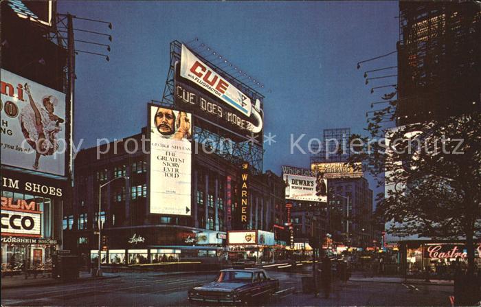 New York City Fabulous Times Square Cue Toothpaste sign at night