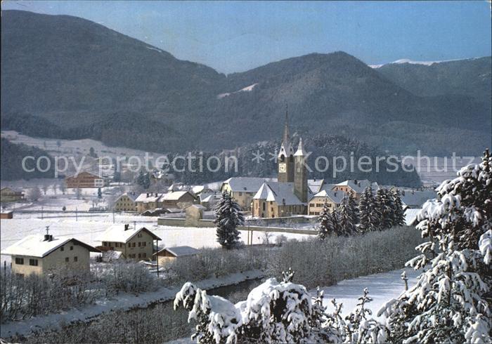 St Lorenzen Suedtirol Ortsansicht mit Kirche Winterlandschaft