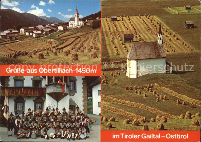 Obertilliach Trachtengruppe Kirche Teilansicht