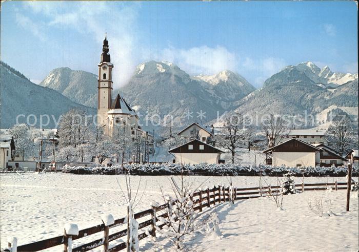 Flintsbach Inn Ortsansicht mit Kirche Winterpanorama mit Wendelsteingruppe Bayer