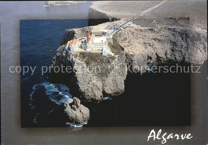 Sagres Algarve Cabo de Sao Vicente Kap Leuchtturm Steilkueste Fliegeraufnahme