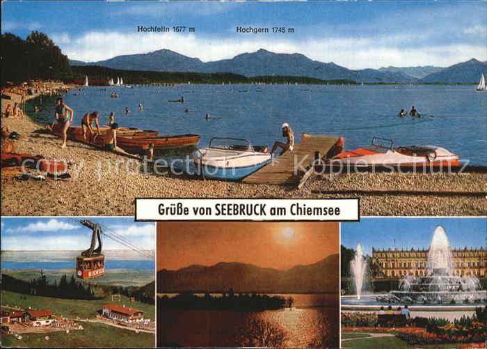 Seebruck Chiemsee Badestelle mit Motorbooten Seilbahn Sonnenuntergang Brunnen