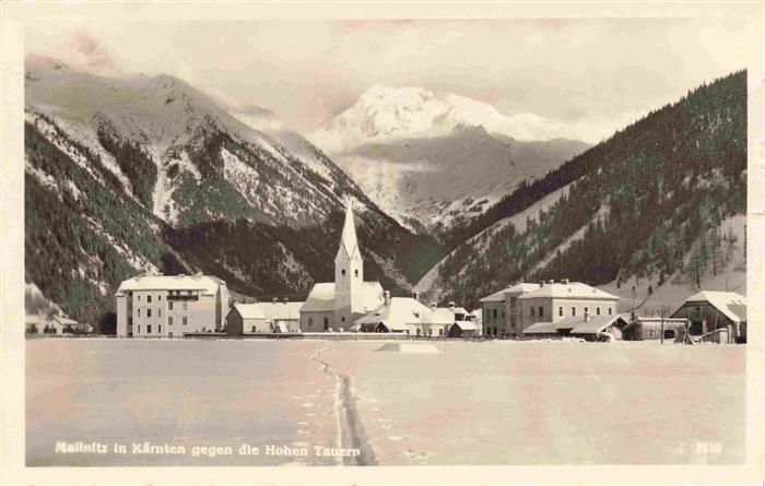Mallnitz Tauernbahn Kaernten AT Ortsansicht mit Kirche Blick gegen Hohe Tauern