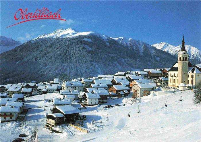 Obertilliach Tirol AT Winterpanorama Ortsansicht mit Kirche