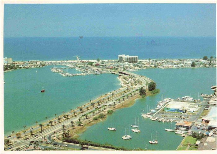 Clearwater Florida Scenic causeway winding toward the beach aerial view
