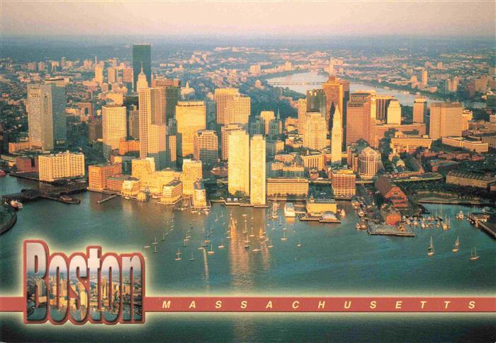 BOSTON  Massachusetts USA Sun rising out of the Atlantic Ocean Downtown aerial v