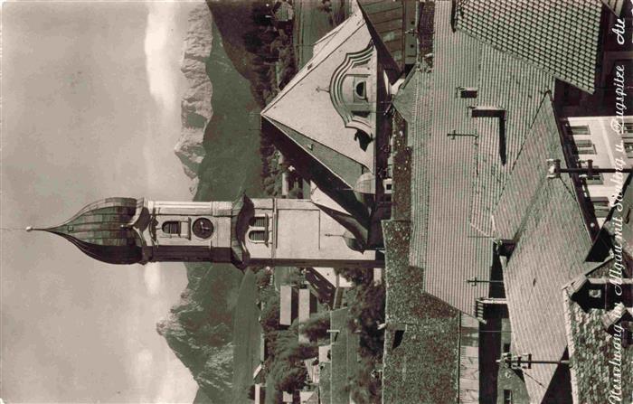 Nesselwang Allgaeu Bayern mit Kirche Saeuling und Zugspitze