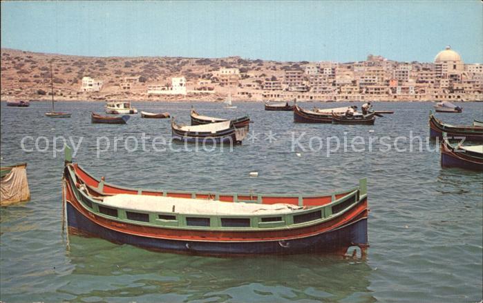 Malta St Pauls Bay with Luzzu fishing boats at anchor