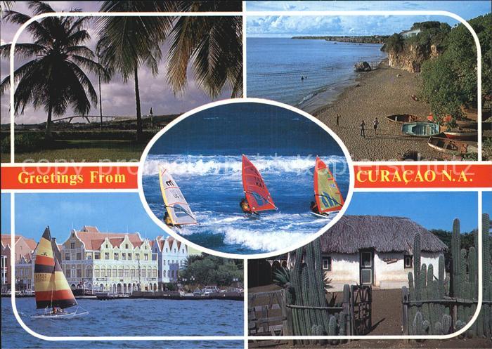 Curacao Niederlaendische Antillen Palmen Strand Hafen Straw covered cottage