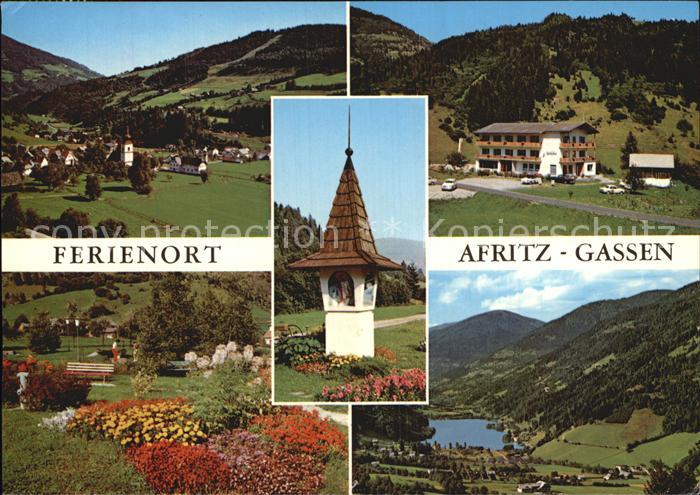 Afritz See Teilansicht Kirche Wegekreuz Park See