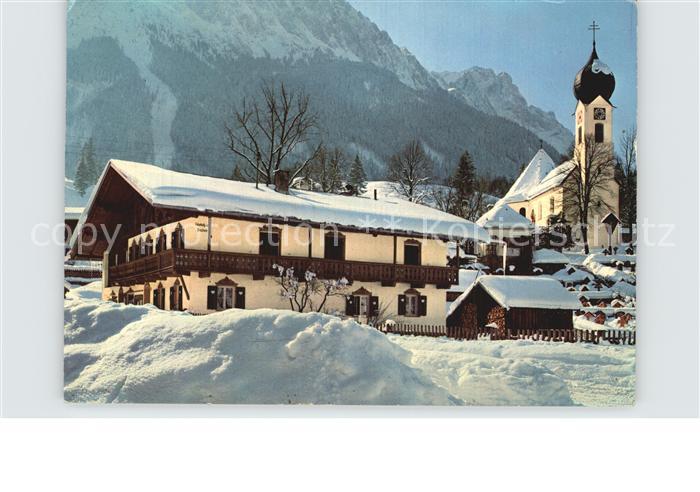 Grainau Ortsansicht mit Kirche Blick zur Zugspitze Wettersteingebirge im Winter