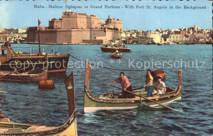 Malta Maltese Dghajsas in Grand Harbourg with Fort St Angelo