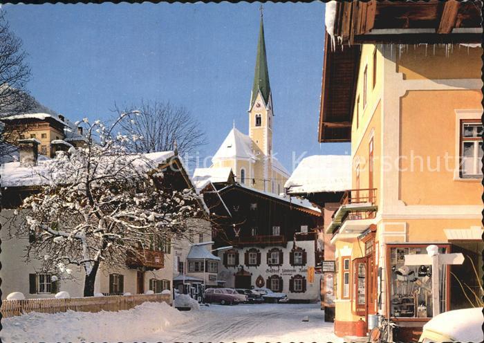 Kirchberg Tirol Ortsmotiv mit Kirche im Winter