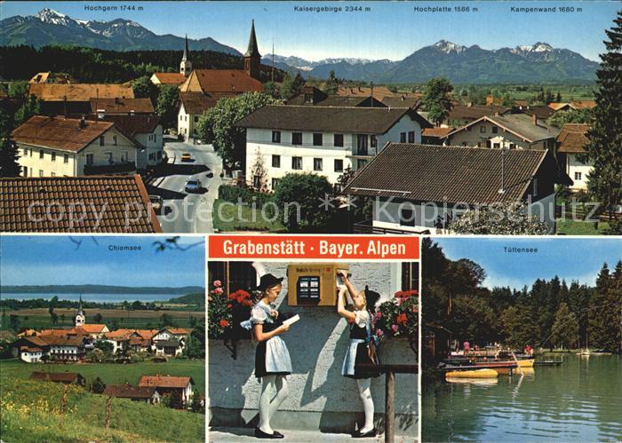 Grabenstaett Chiemsee Ortsansicht mit Kirche Alpenblick Chiemsee Trachten Tuette