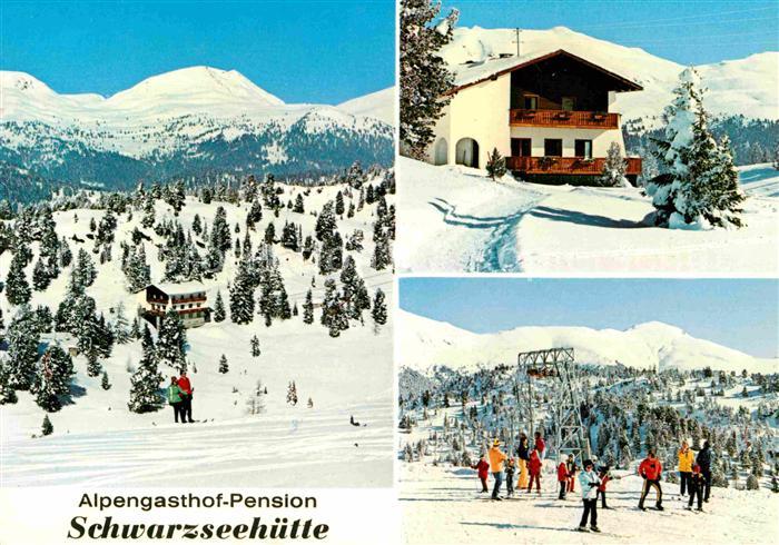 Ebene Reichenau Kaernten Alpengasthof Pension Schwarzseehuette Winterpanorama Sk