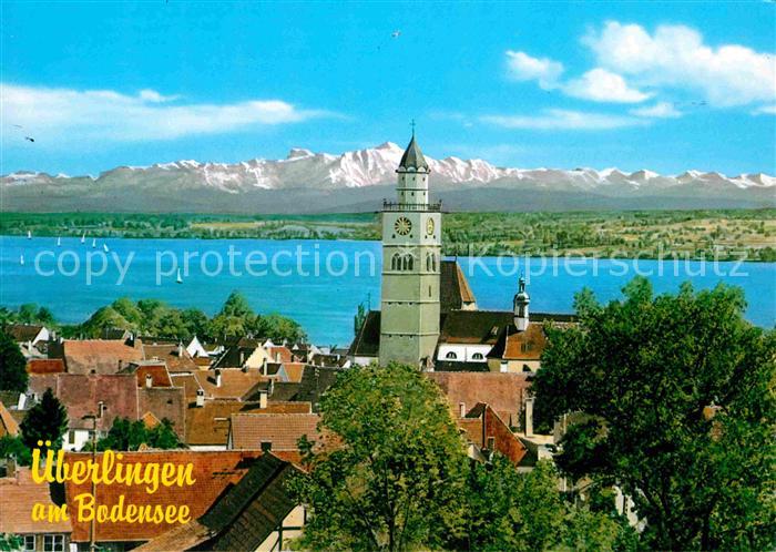 ueberlingen Bodensee Ortsansicht mit Kirche mit Blick auf die Schweizer Alpen Kn