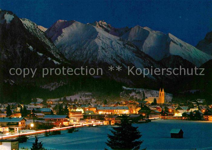 Oberstdorf bei Nacht mit Kegelkopf Krottenkopf Fuerschiesser und Kratzer