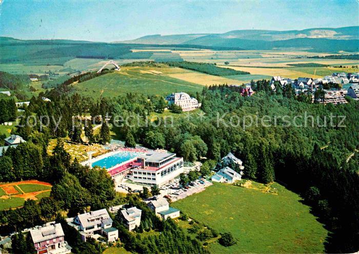 Winterberg Hochsauerland Fliegeraufnahme mit Freibad und Hallenbad