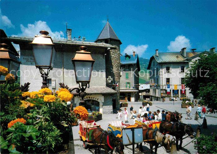 Megeve Place de l'Eglise Les attelages