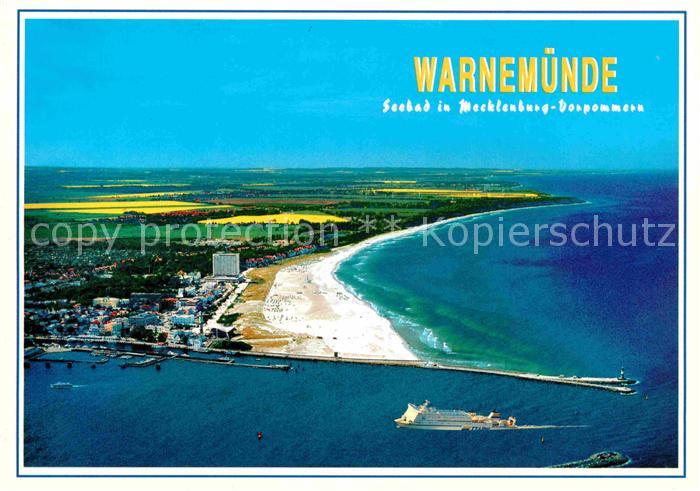Warnemuende Ostseebad Fliegeraufnahme Hafeneinfahrt und Strand Hotel Neptun