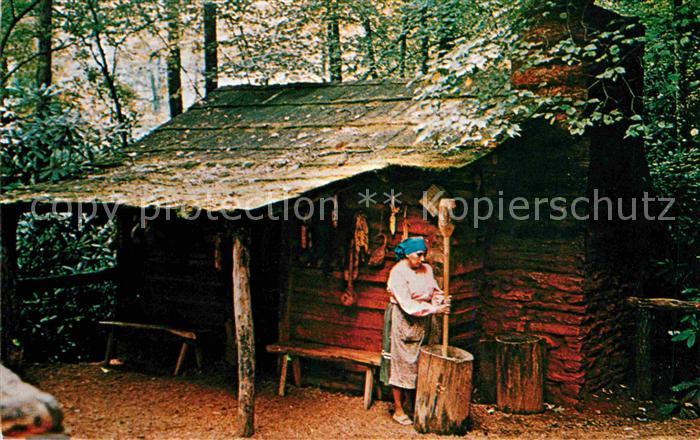 Cherokee North Carolina Cherokee Woman pounding corn