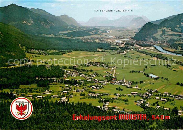 Muenster Tirol mit Kaisergebirge Fliegeraufnahme
