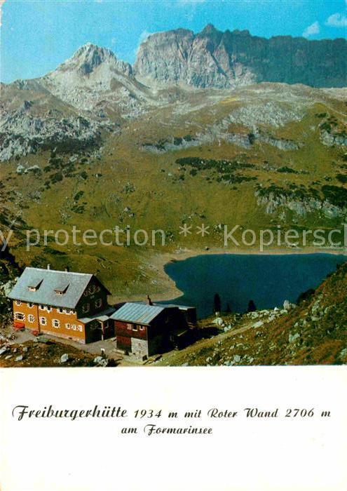 Dalaas Freiburgerhuette mit Roter Wand am Formarinsee Lechquellengebirge