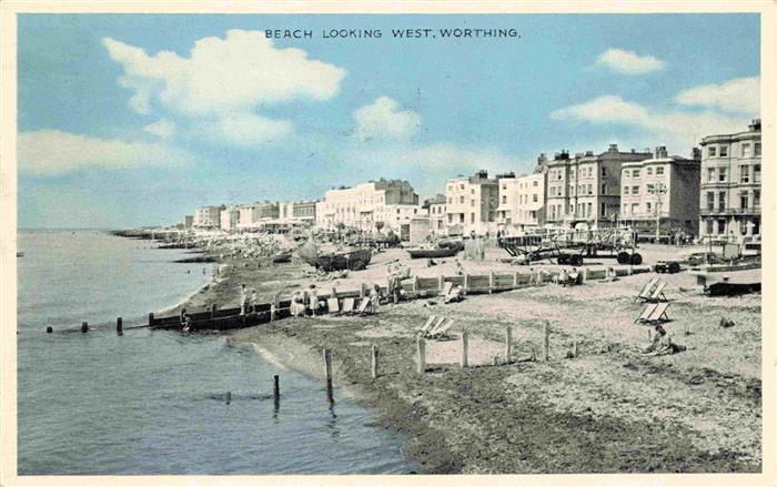 Worthing  West Sussex UK Strand Beach Strandliegen Kueste Meer Kuestenhaeuser St