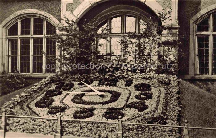 Bernburg Saale Blumenuhr Bogenfenster Gebaeude Park Blumen Historismus