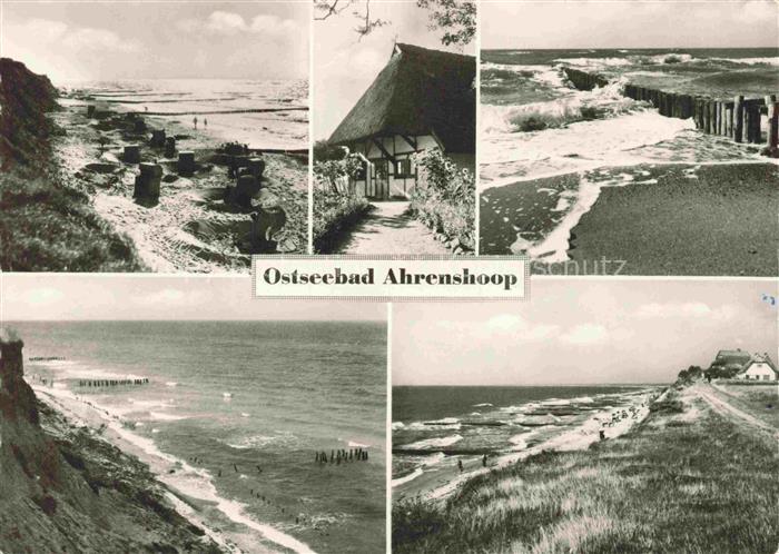 Ahrenshoop Ostseebad Strand Ostsee Reetdachhaus Steilkueste Strandkoerbe Wellenb