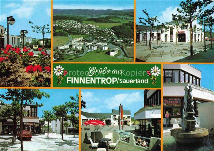 Finnentrop Sauerland Stadtansicht Fliegeraufnahme Fussgaengerzone Brunnen Eiscaf