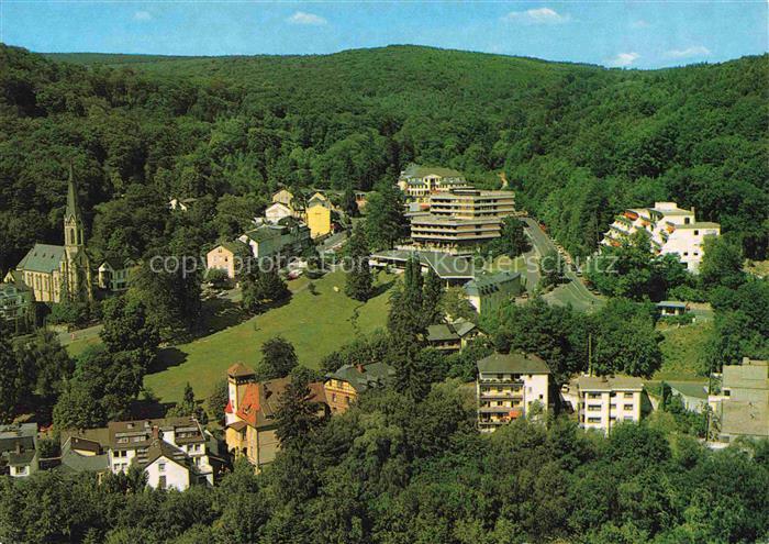Schlangenbad Taunus Hessen Taunus Kurort Kirche Hochhaus Hotel Wald Huegel Ortsa