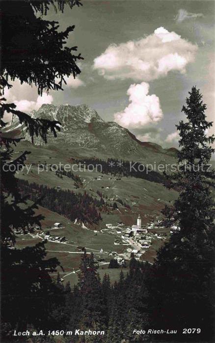 LECH  Arlberg Vorarlberg AT Karhorn Ortschaft Kirchturm Bergtal Wiesen Fichten A