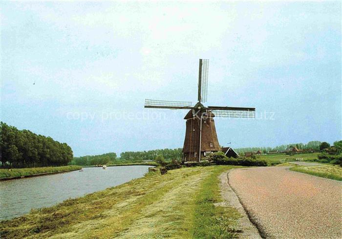 Purmerend Noord-Holland NL De-Neckermolen Windmuehle Kanal Polderland Weg Baeume