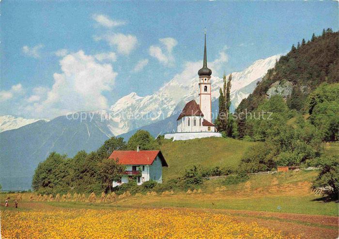 Mieming Tirol AT Inntal Mieminger-Gruppe Kirche Zwiebelturm Bergpanorama Schnee